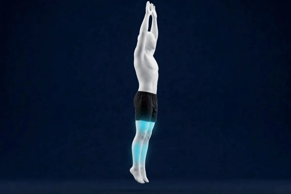 Burpees, position en saut, corps tendu en l'air.